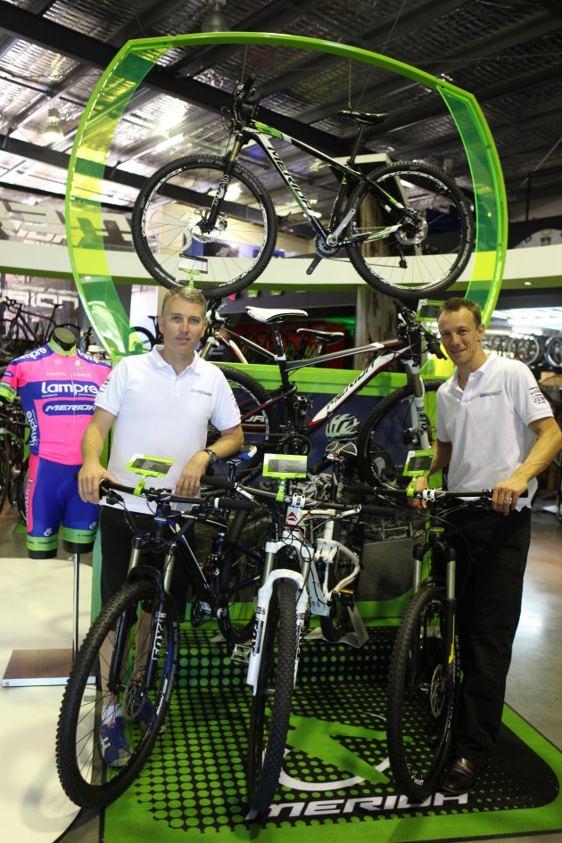 Ged Collins (left) and Andrew Garnsworthy with one of the custom display stands they&rsquo;ve had designed and made in Brisbane for their dealers.